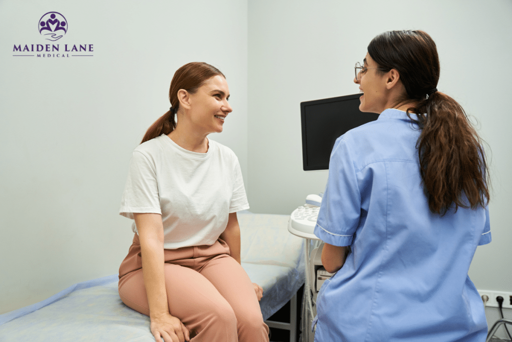 A woman that struggles with leg pain that aligns with her menstrual cycle at the doctor for an ultrasound to determine if she has Sciatic Endometriosis in New York, Manhattan.
