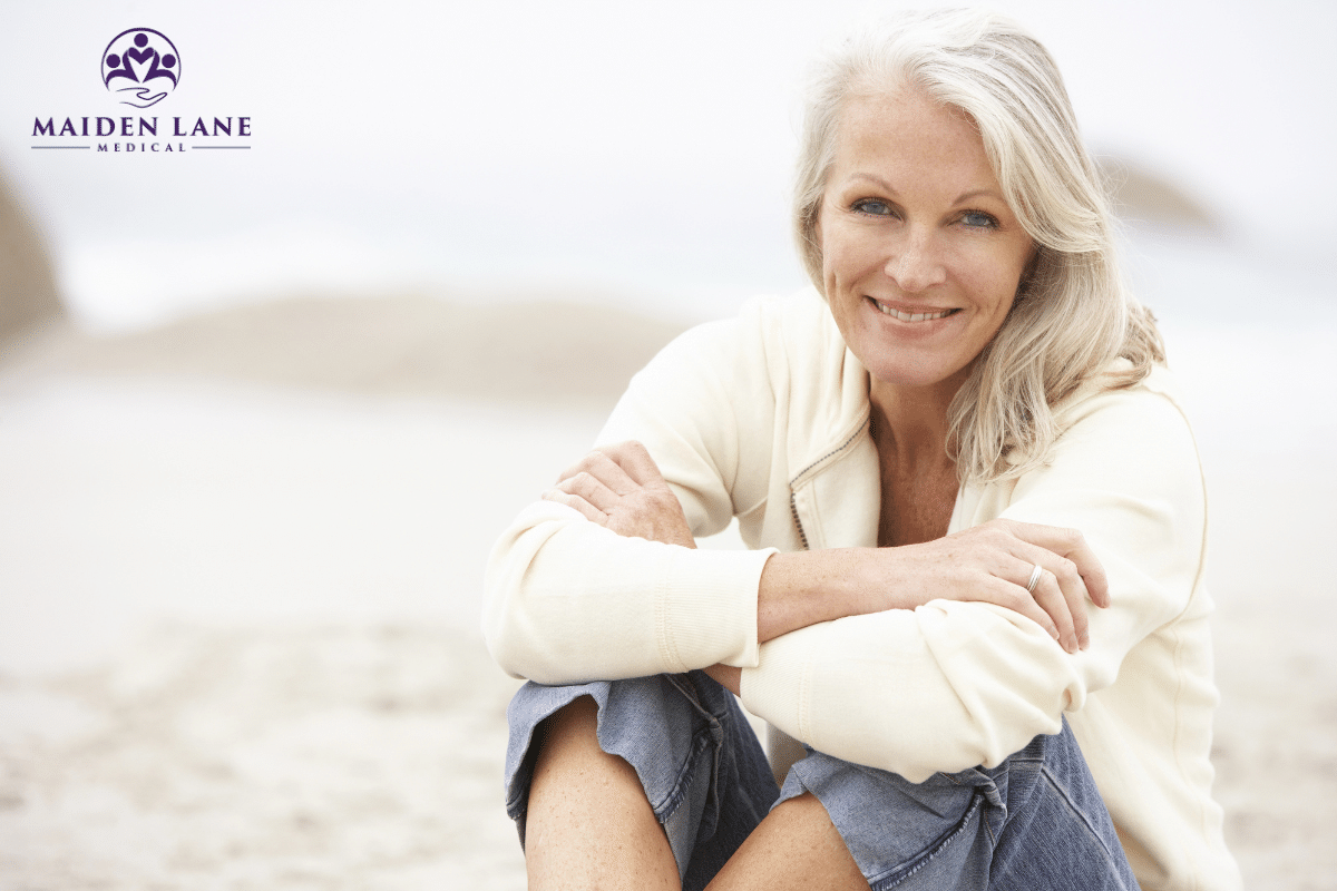A happy woman after getting treated for chronic pain in New York.