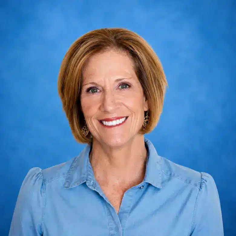 Headshot of Rhonda R. Stewart, MD with blue background